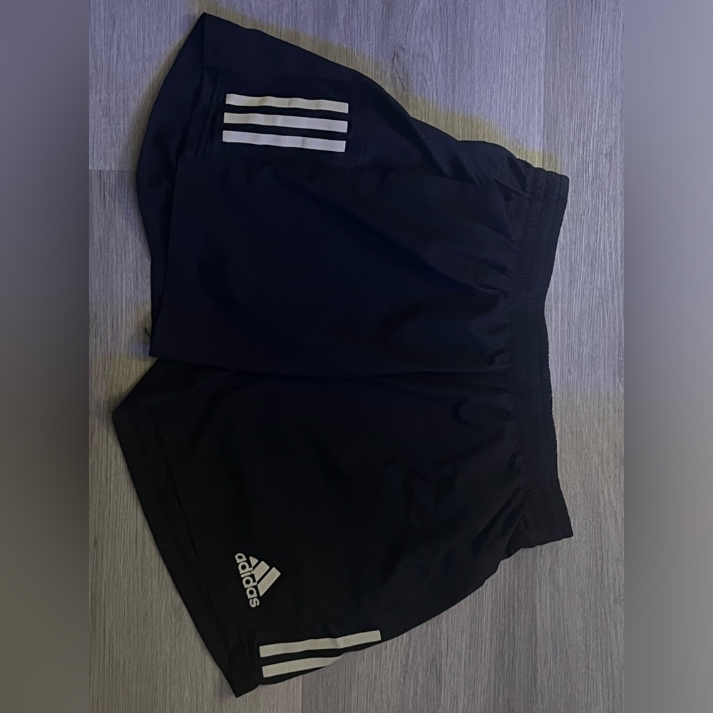 Reflective Adidas activity/running shorts.